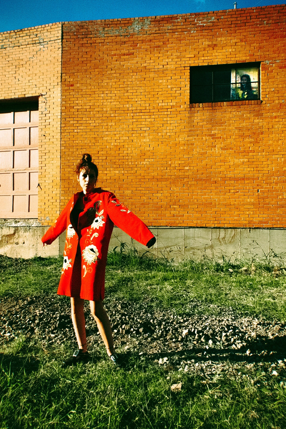 Rouge study — red structure against brick