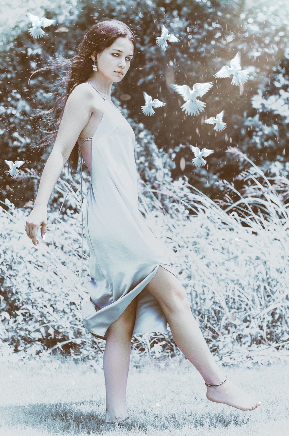 A pale figure in white moving through an ivory landscape — the Secret study